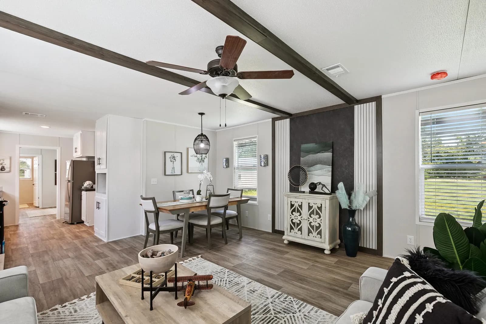 Photo: Living room, Bravo 16763N. Cavco's photo of this model; it can show options and other finishes.