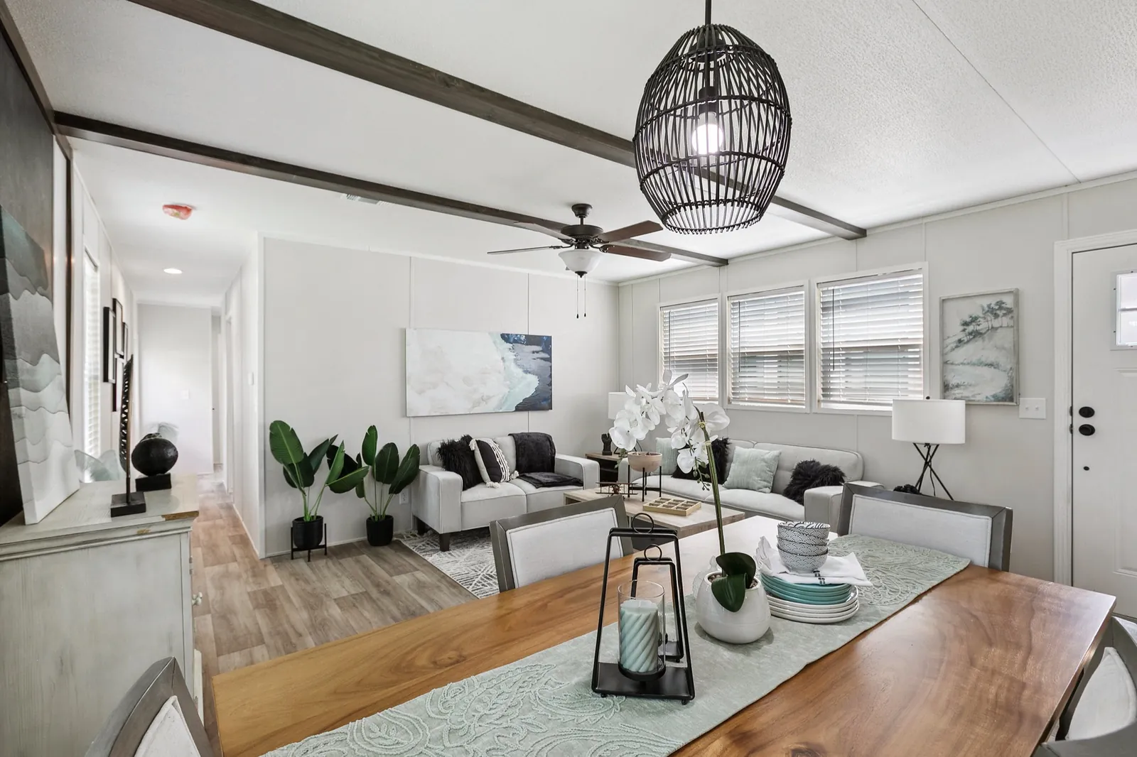Photo: Living room, Bravo 16763N. Cavco's photo of this model; it can show options and other finishes.
