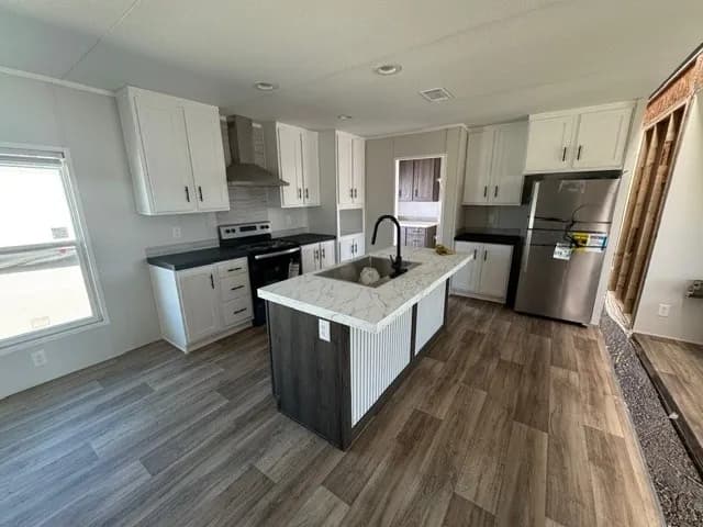 Photo: Kitchen, Bravo 28603N. Cavco's photo of this model; it can show options and other finishes.