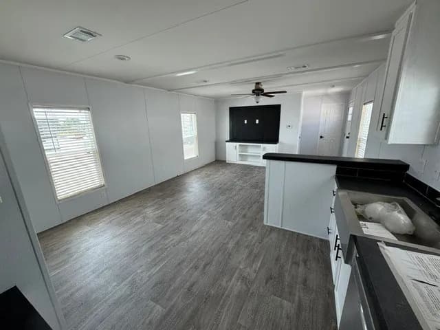 Photo: Kitchen, Landmark 16562L (2BR). Cavco's photo of this model; it can show options and other finishes.